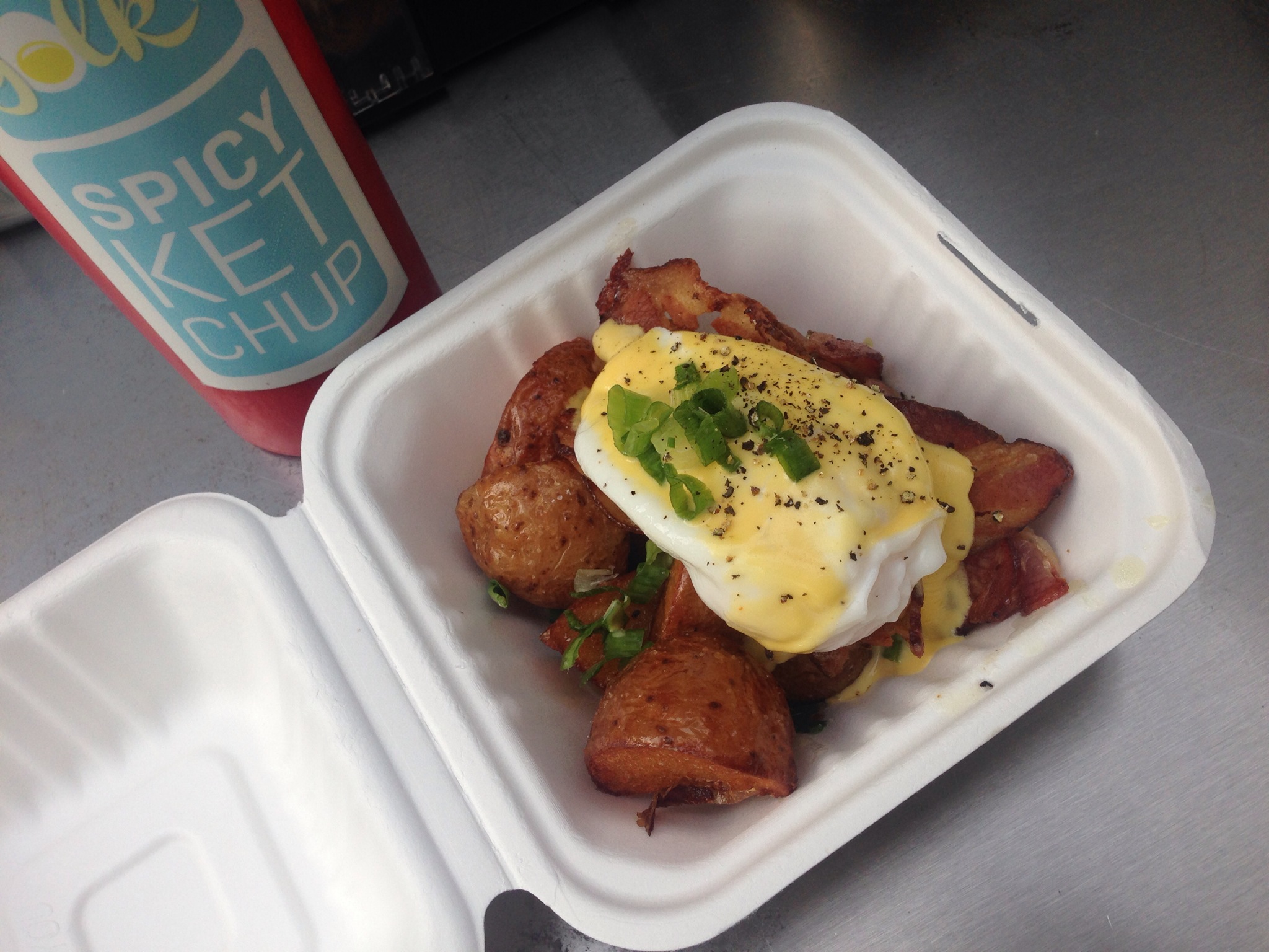 Poached Egg on Truffle Lemon Hash Brown @ Yolks Breakfast Food Truck