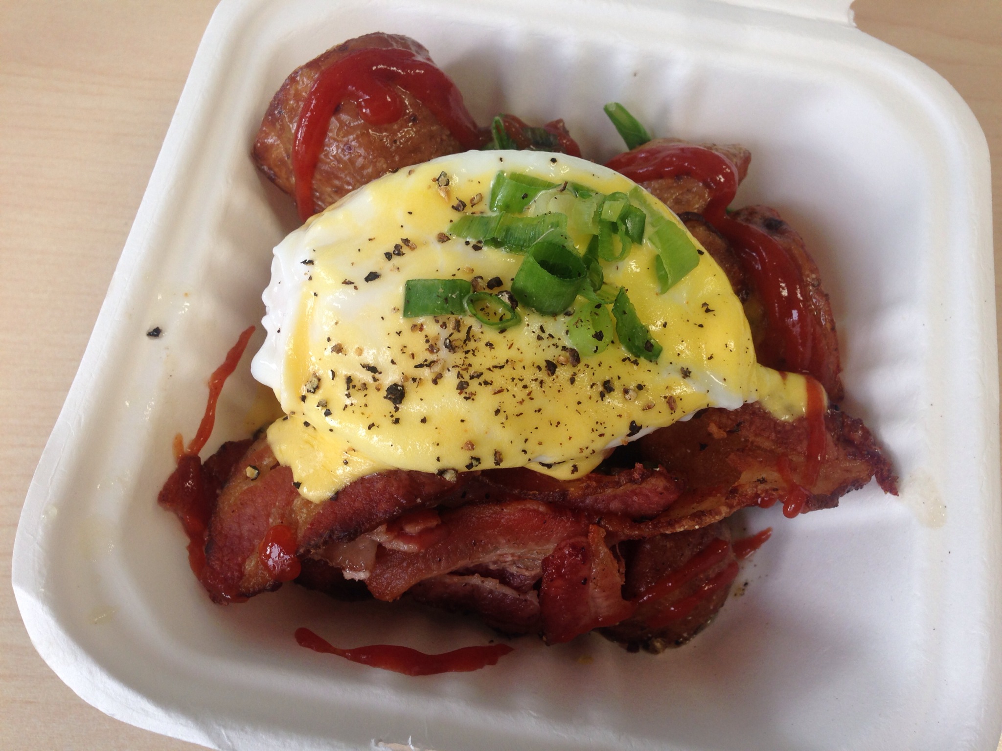 Poached Egg on Truffle Lemon Hash Brown @ Yolks Breakfast Food Truck