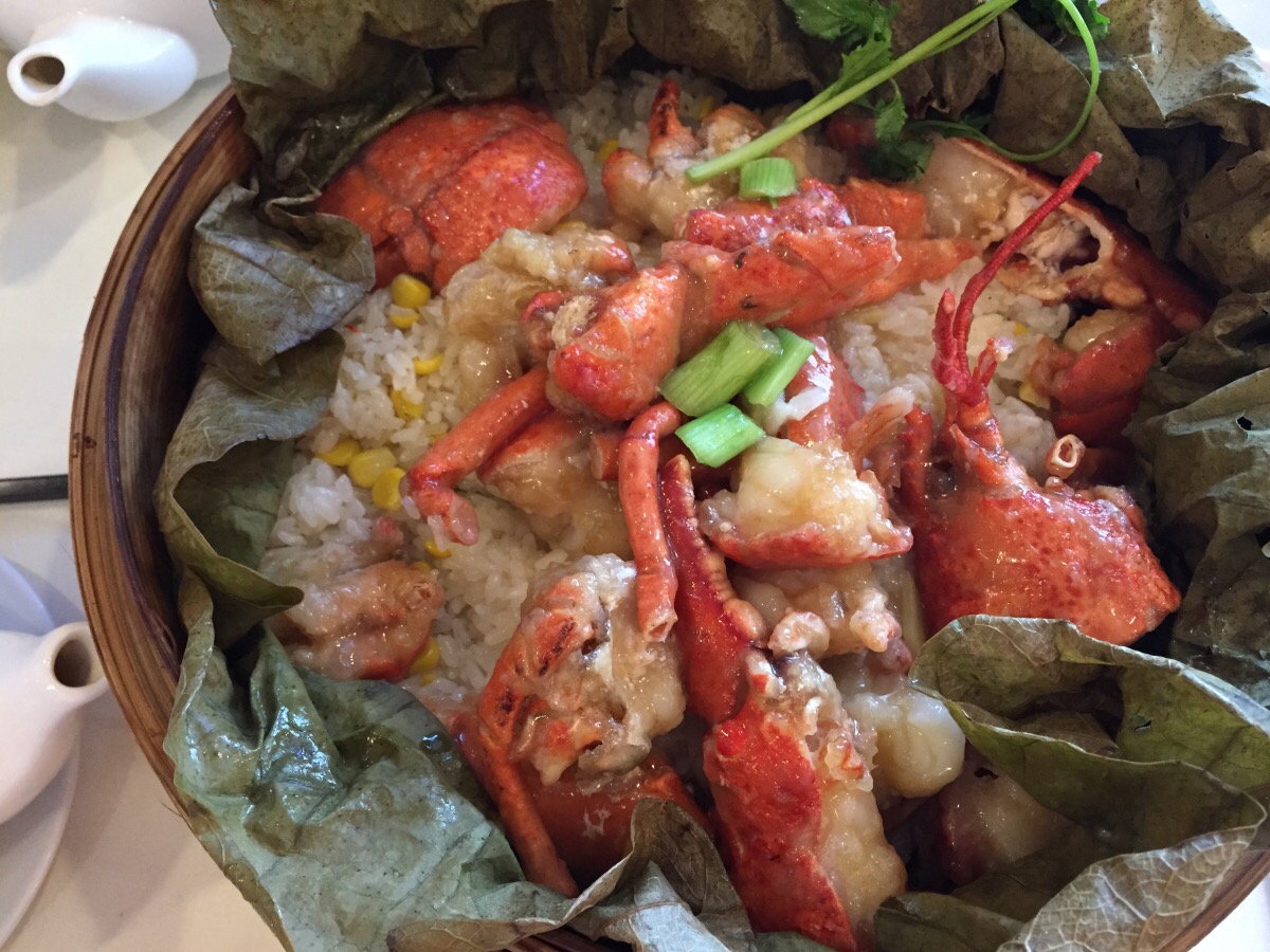 Lobster Steamed with Sticky Rice on Lotus Leaf