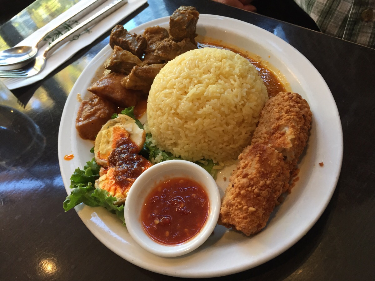 lunch combo with curry beef, spring roll, and sambal egg lunch combo with curry beef, spring roll, and sambal egg