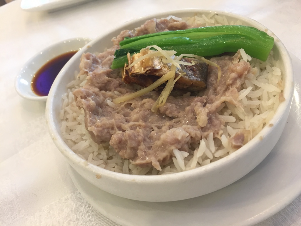 salty fish and meat pie on rice