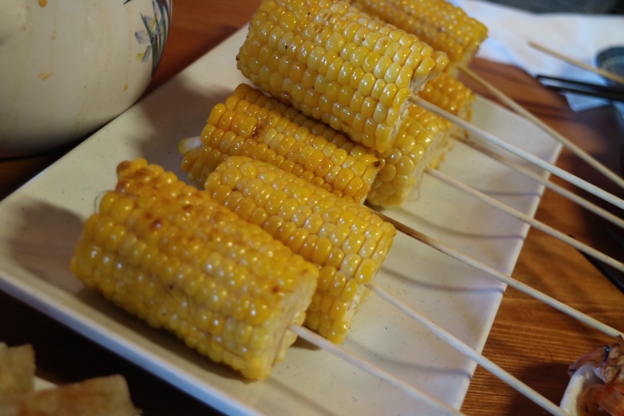 roasted corn on sticks