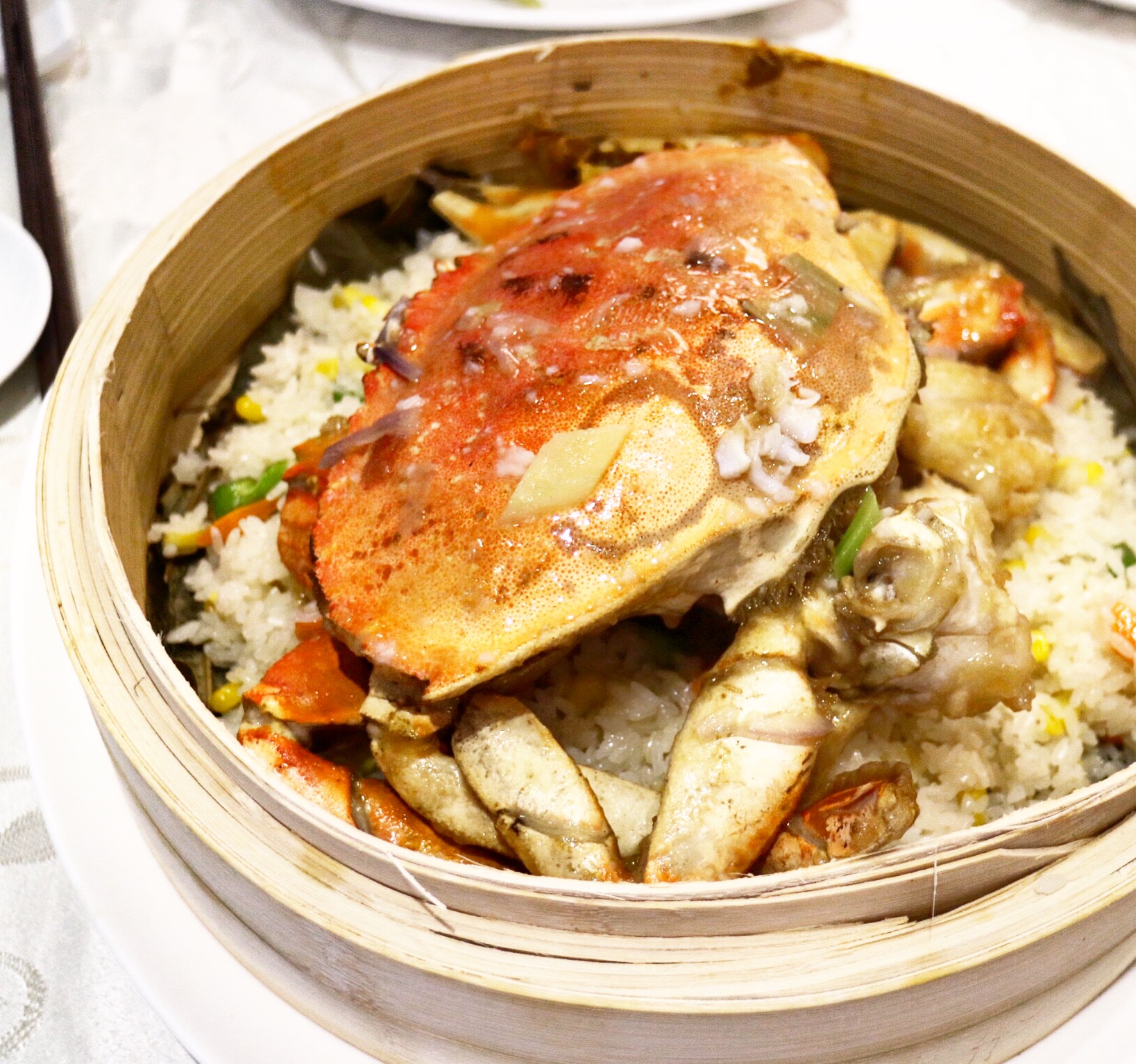 steamed dungeness crab with sticky rice on lotus leaf