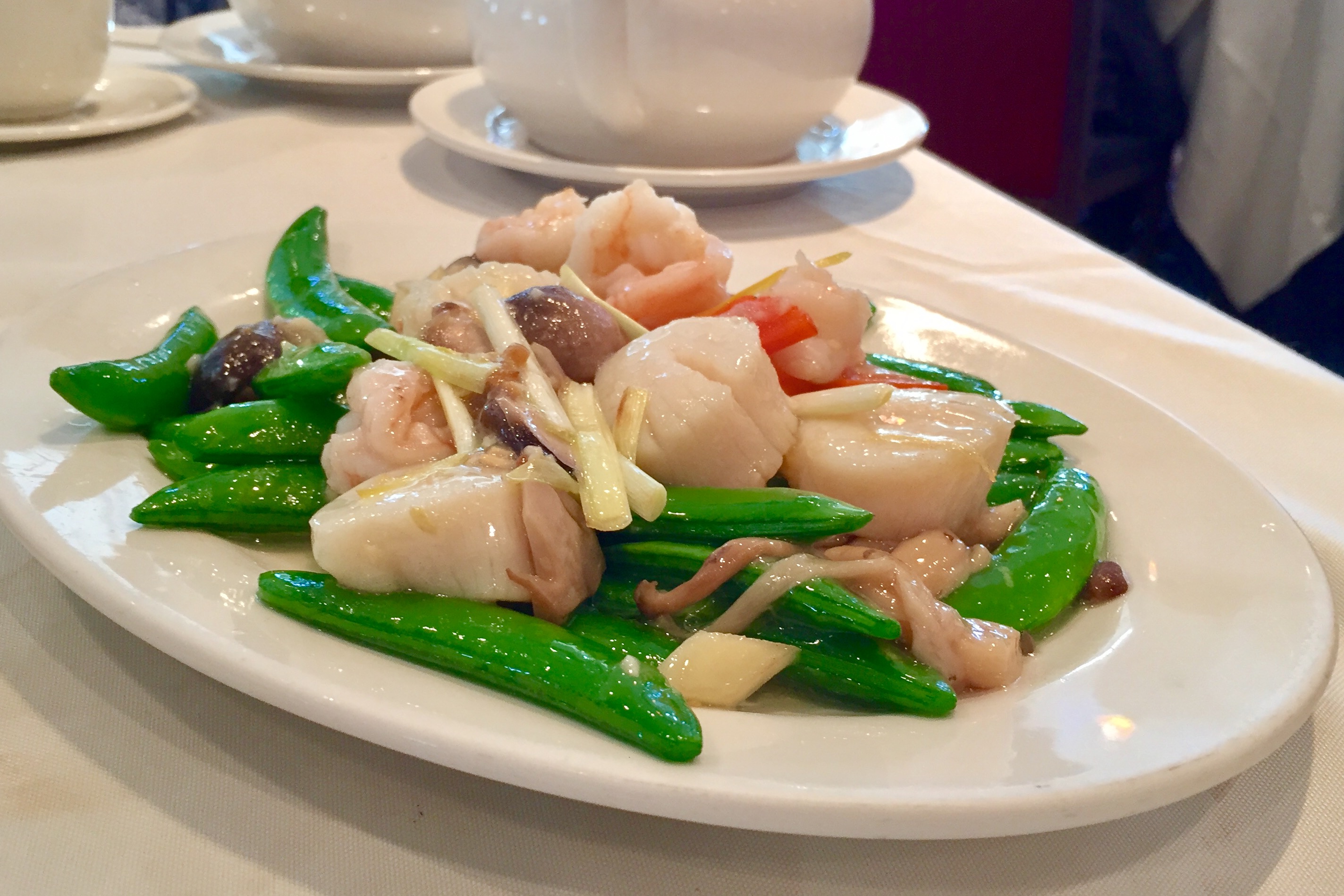 Scallop and Prawn Sautéed with Snap Peas and Assorted Mushrooms