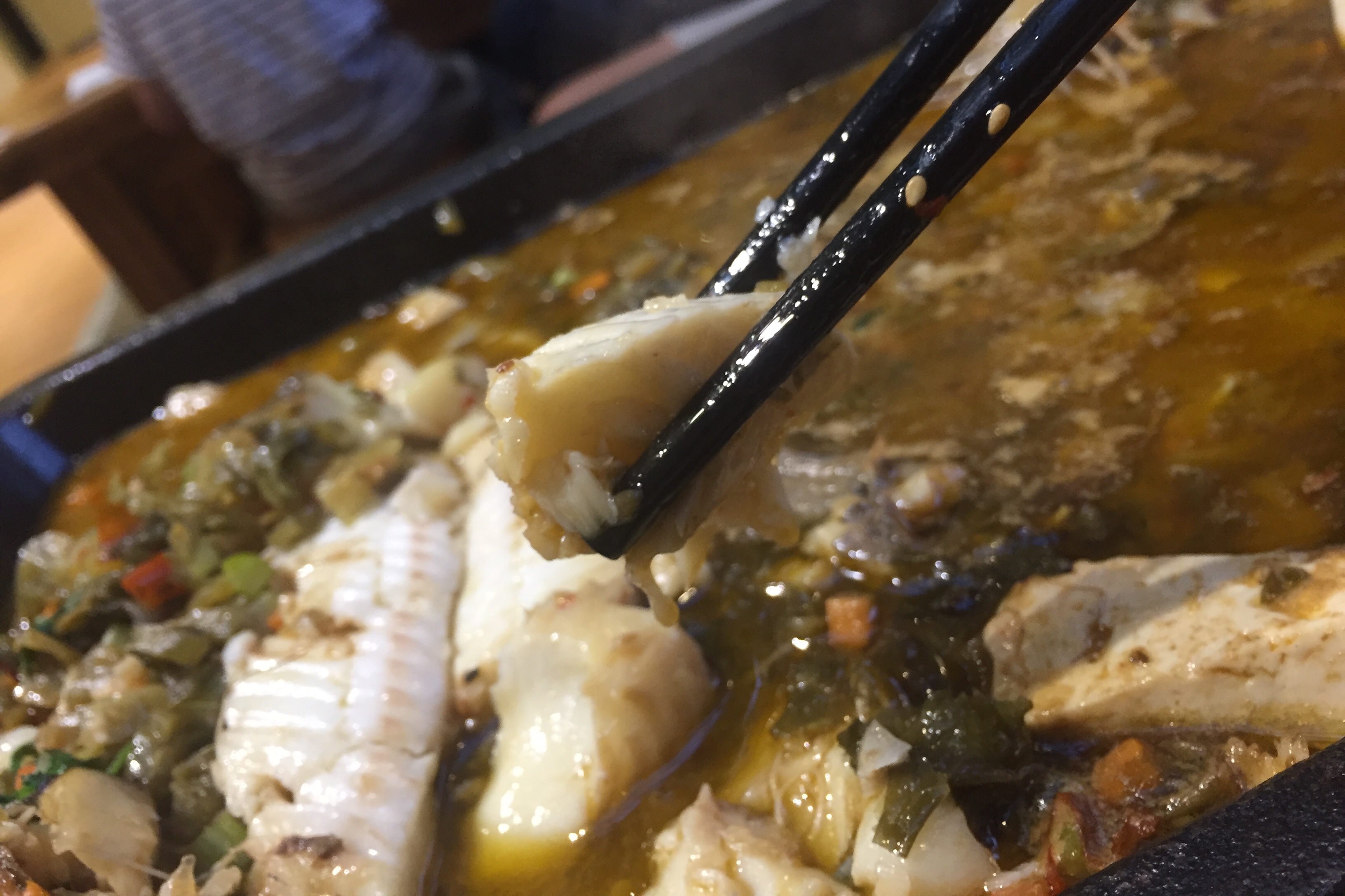 whole black cod in pickle hot pot