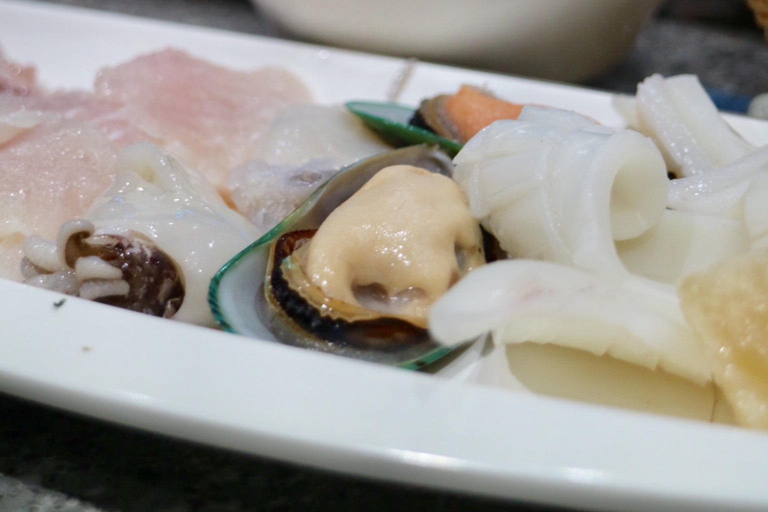 seafood - fish fillet, baby squid, mussel, and squid