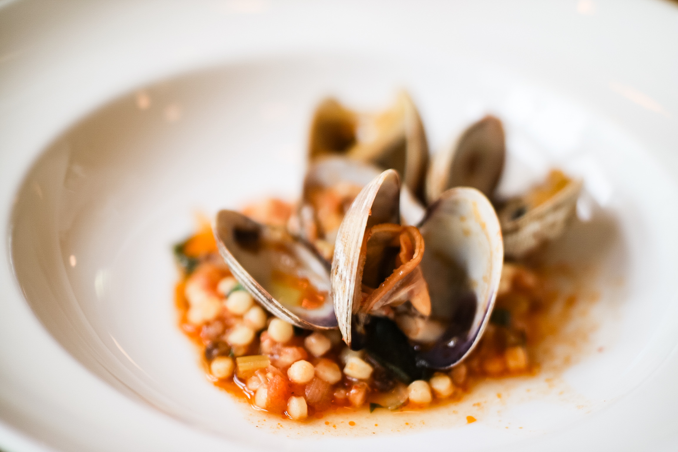 Fregola, clams, preserved tomato, chili