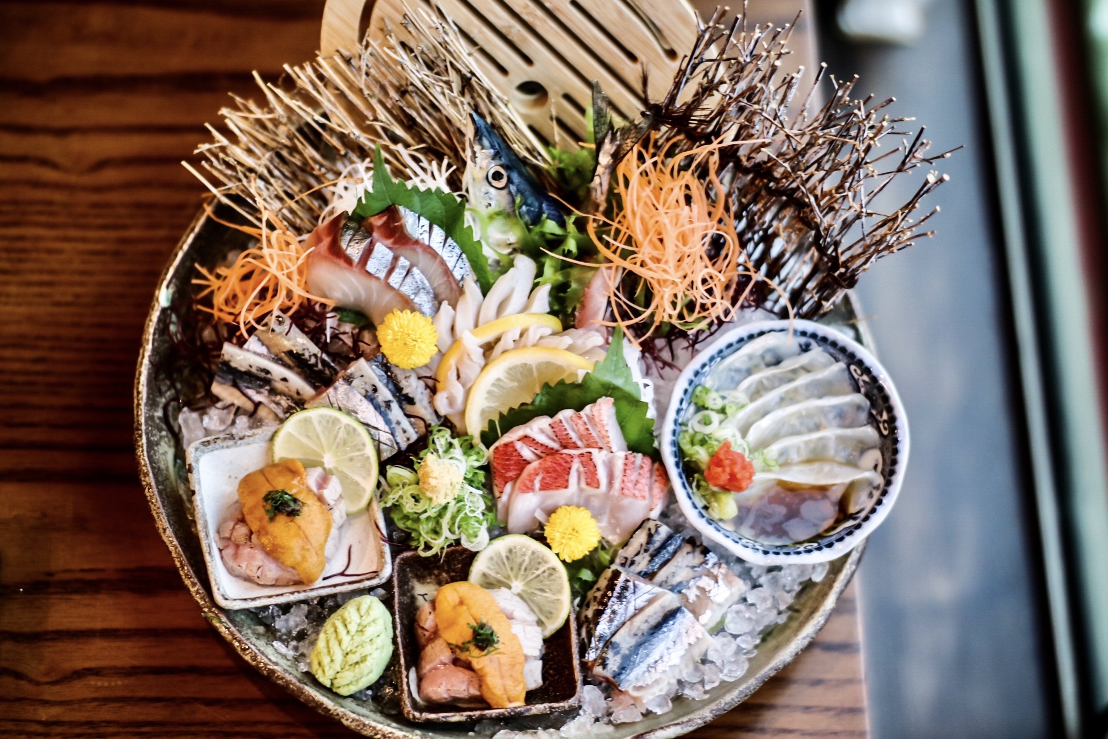 from top left, clockwise: ma-aji, mirugai, hirame, shima aji, o-toro + uni + truffle + kinmedai
